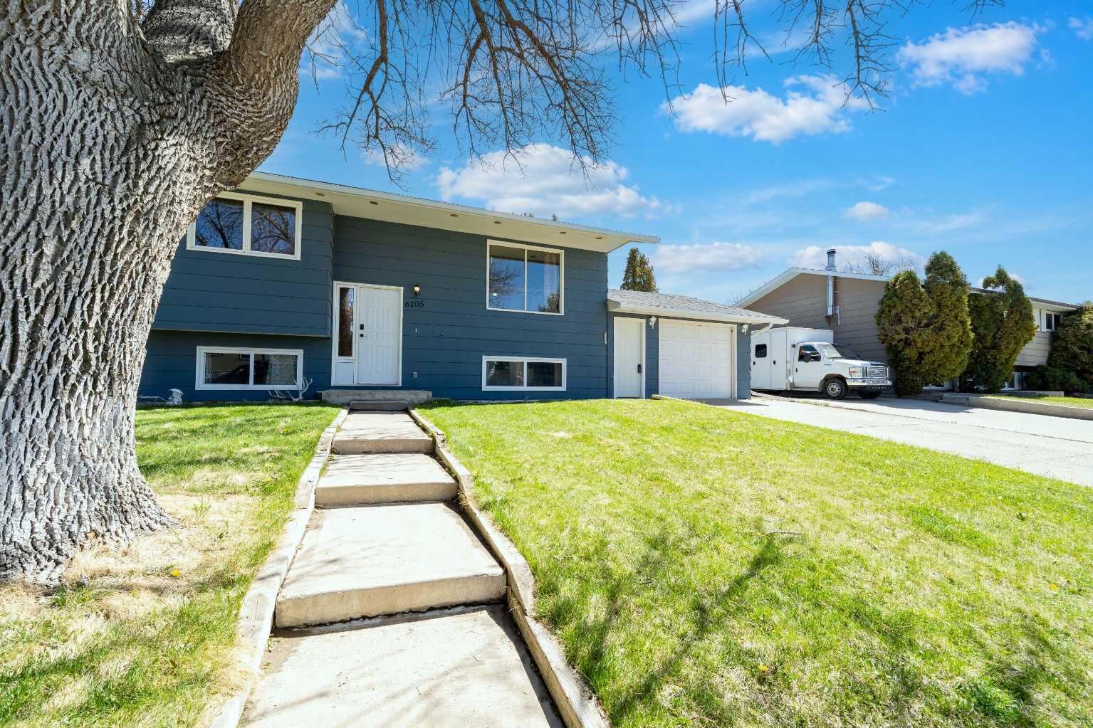 Property Photo:  6105 50 Street  AB T1G 1J7 