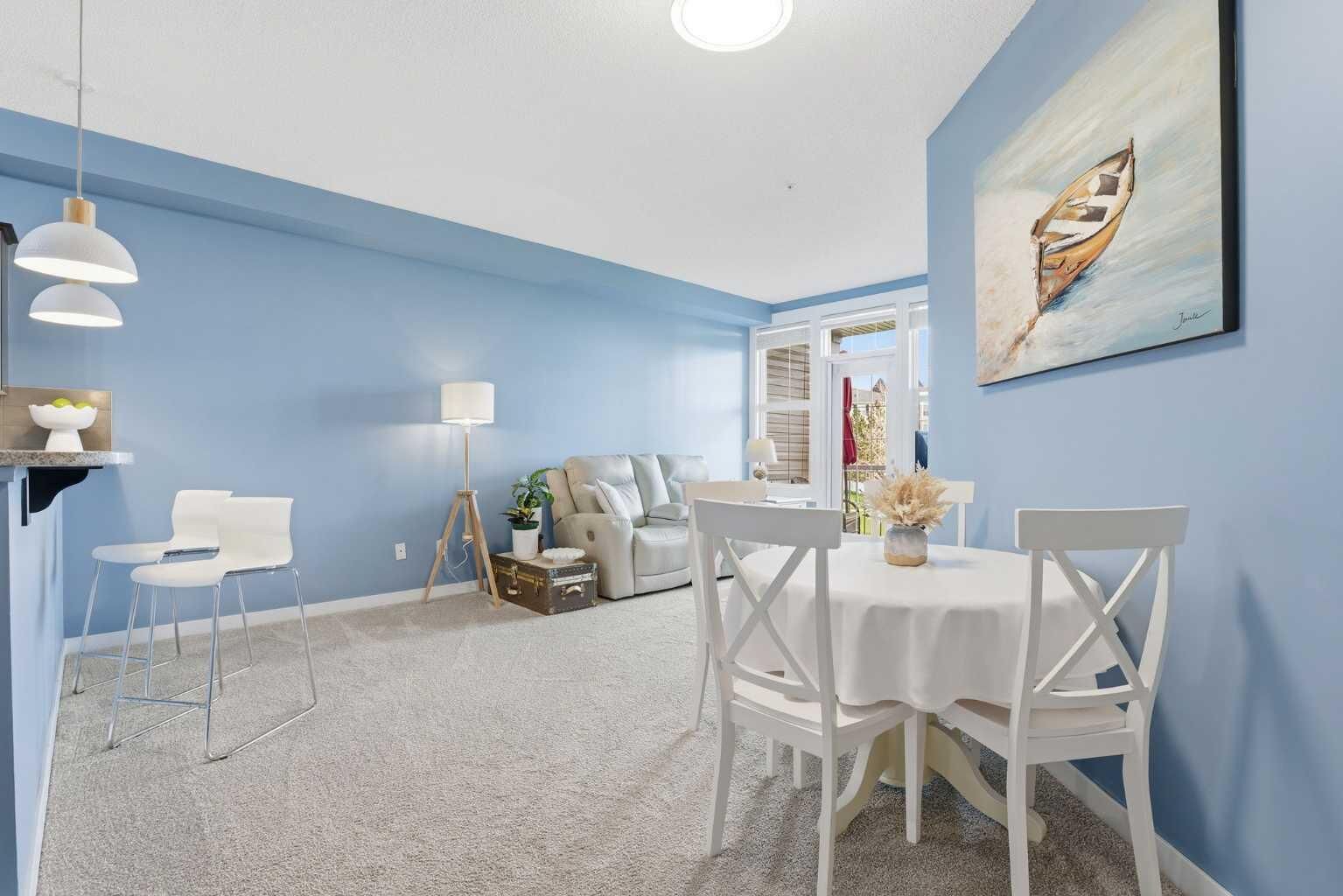 Property Photo:  1 Crystal Green Lane 228  AB T1S 0C5 