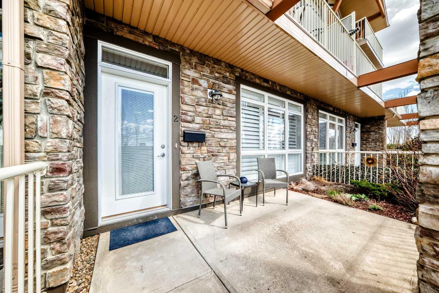 Property Photo:  132 Rockyledge View NW 2  AB T3G 5Y3 
