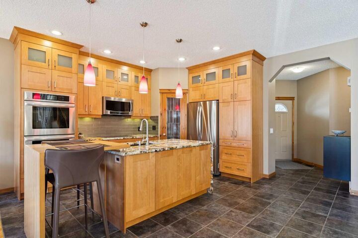 Property Photo:  128 Tuscany Vista Crescent NW  AB T3L 3A2 