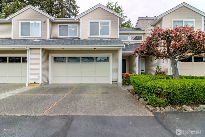 Property Photo:  4714  Fairwood Blvd NE 703  WA 98422 