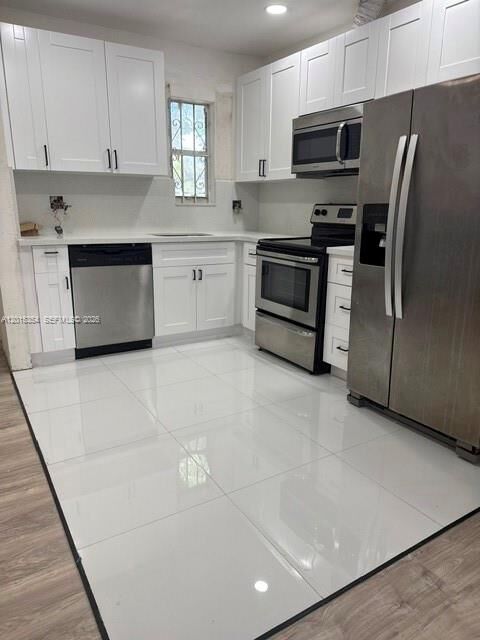 Property Photo:  831 NE 157th Ter  FL 33162 
