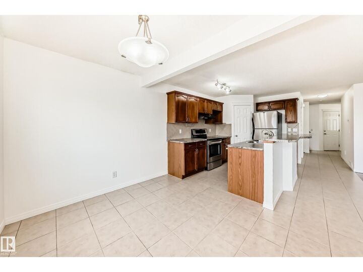 Property Photo:  54 Royal Elm Rd  AB T3G 5V7 