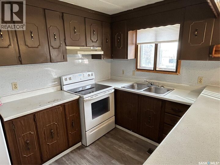 Property Photo:  110 4th Street  SK S0C 0A0 