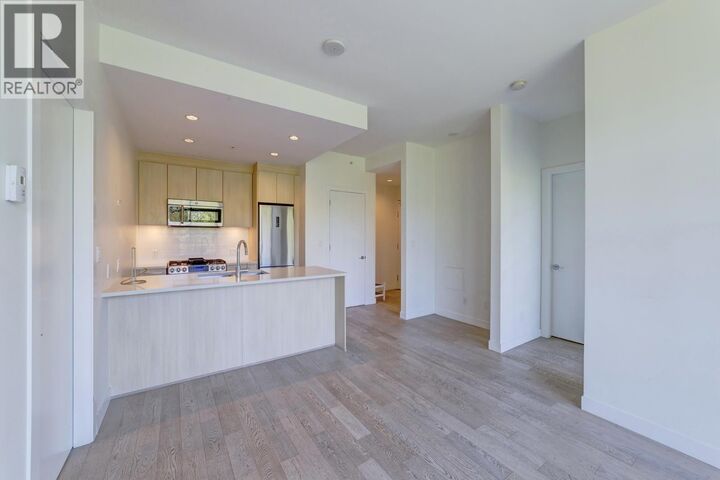 Property Photo:  9060 University Crescent 1xx  BC V5A 0E1 
