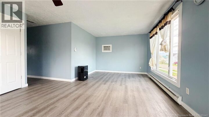 Property Photo:  118 Cedar Street  NB E1C 7L4 