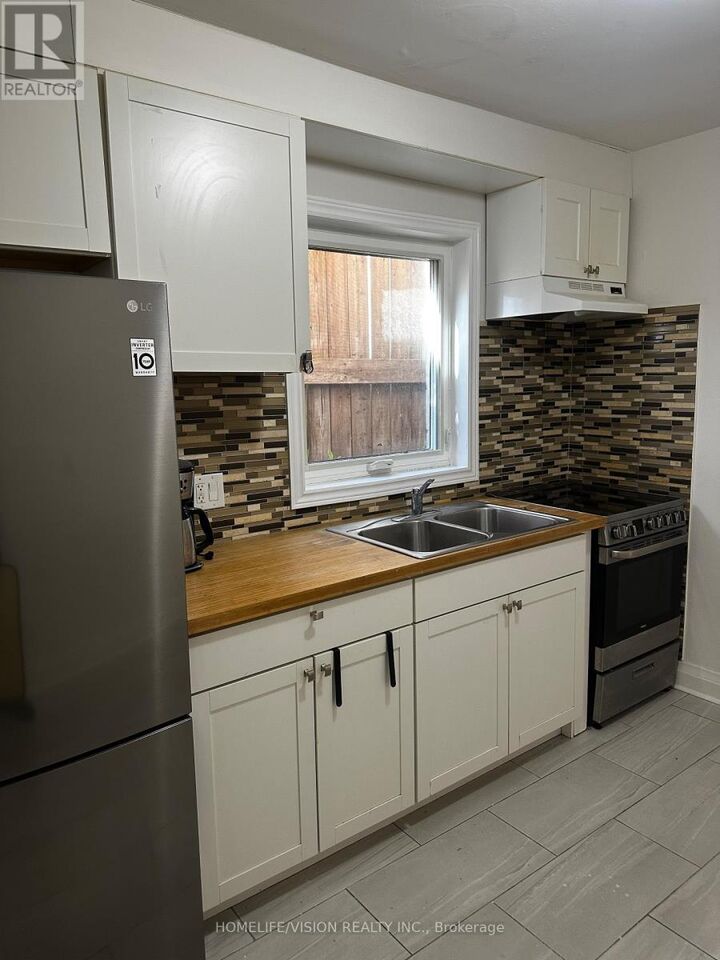 Property Photo:  238 Glebemount Avenue 1  ON M4C 3V2 