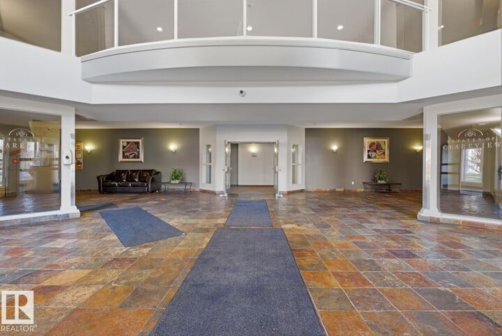 Property Photo:  4312 139 Ave NW 304  AB T5Y 2Z7 