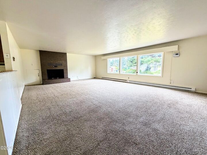 Property Photo:  9459 NW Heron Street  OR 97376 