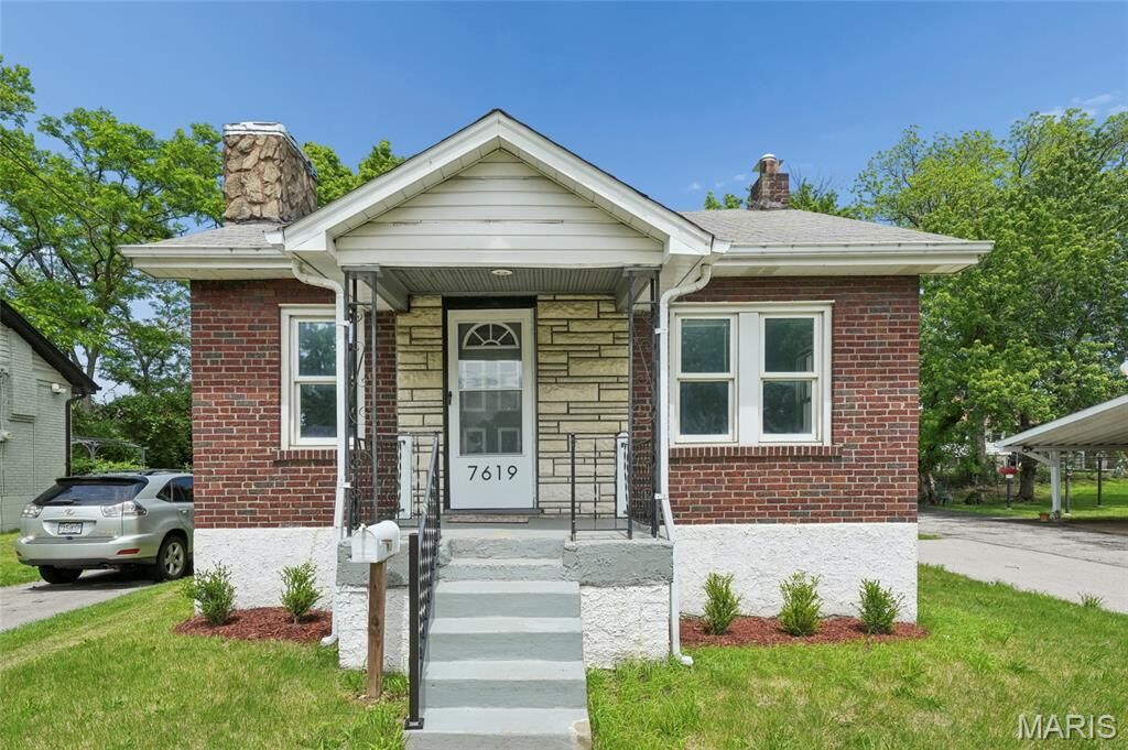 Property Photo:  7619 Fairham Avenue  MO 63130 