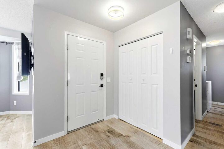 Property Photo:  212 Harvest Wood Way NE  AB T3K 3X7 