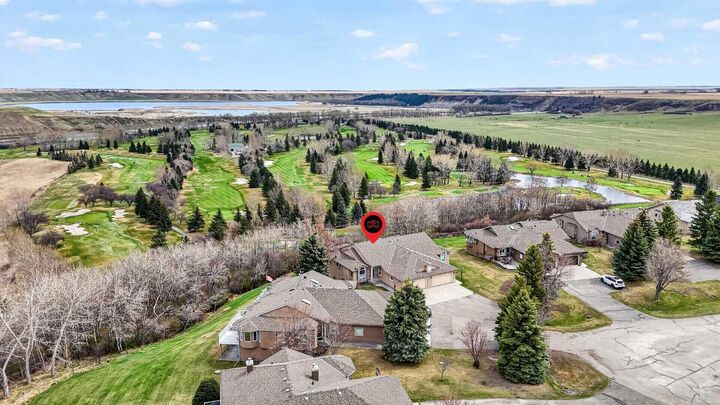 Property Photo:  44 Cottonwood Boulevard  AB T1S 4W2 