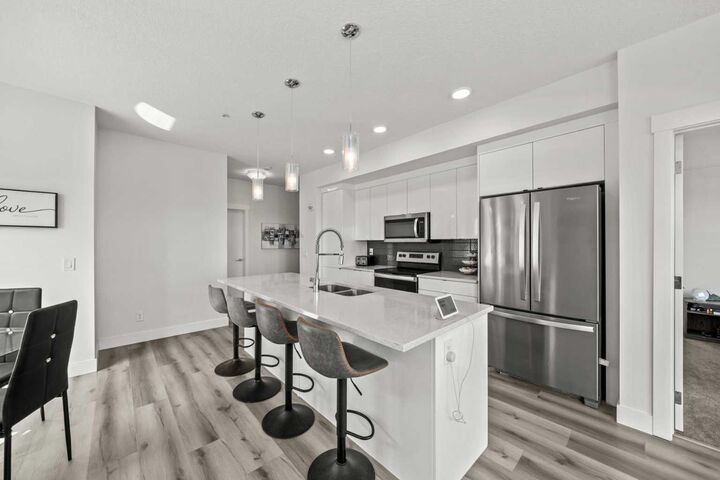 Property Photo:  19661 40 Street SE 305  AB T3M 3H3 