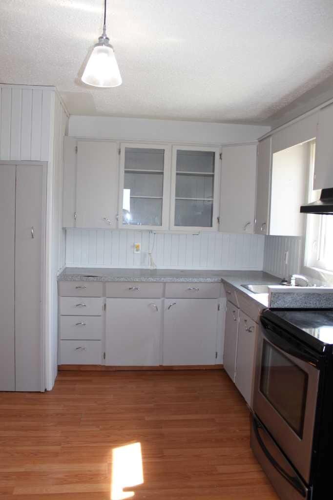 Property Photo:  #208 Main Street  AB T0H 2T0 
