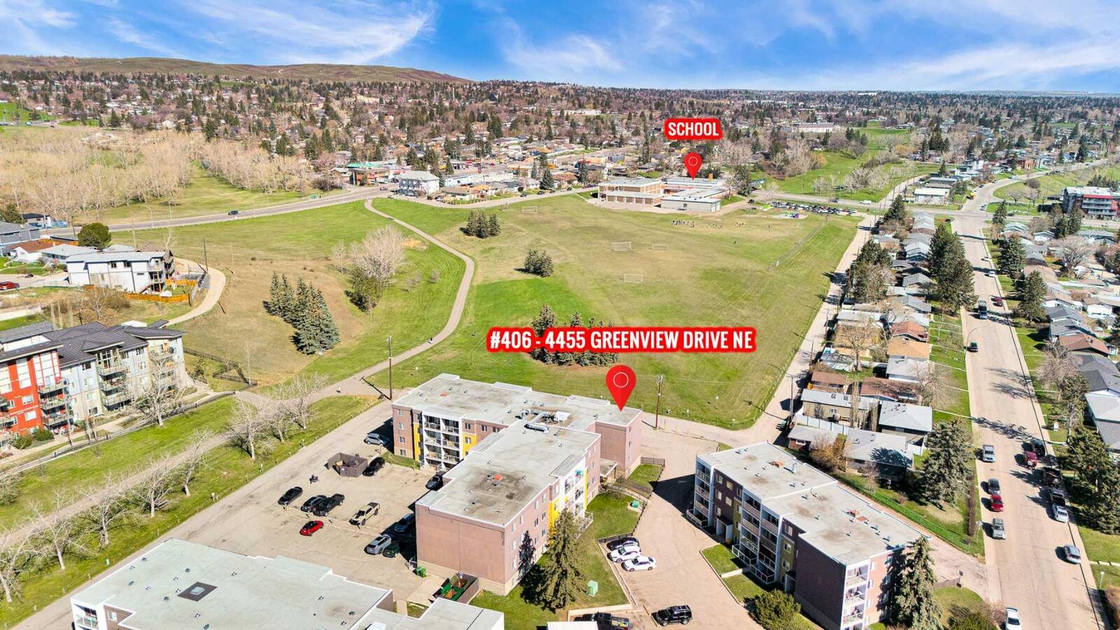 Property Photo:  4455A Greenview Drive NE 406  AB T2E 6M1 