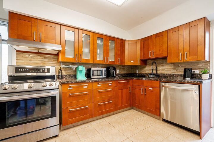 Property Photo:  5959 McMurray Avenue  BC V5H 3E5 