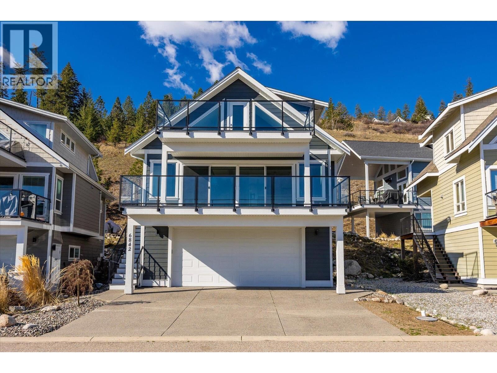 Property Photo:  6842 Madrid Way  BC V1Z 3R8 