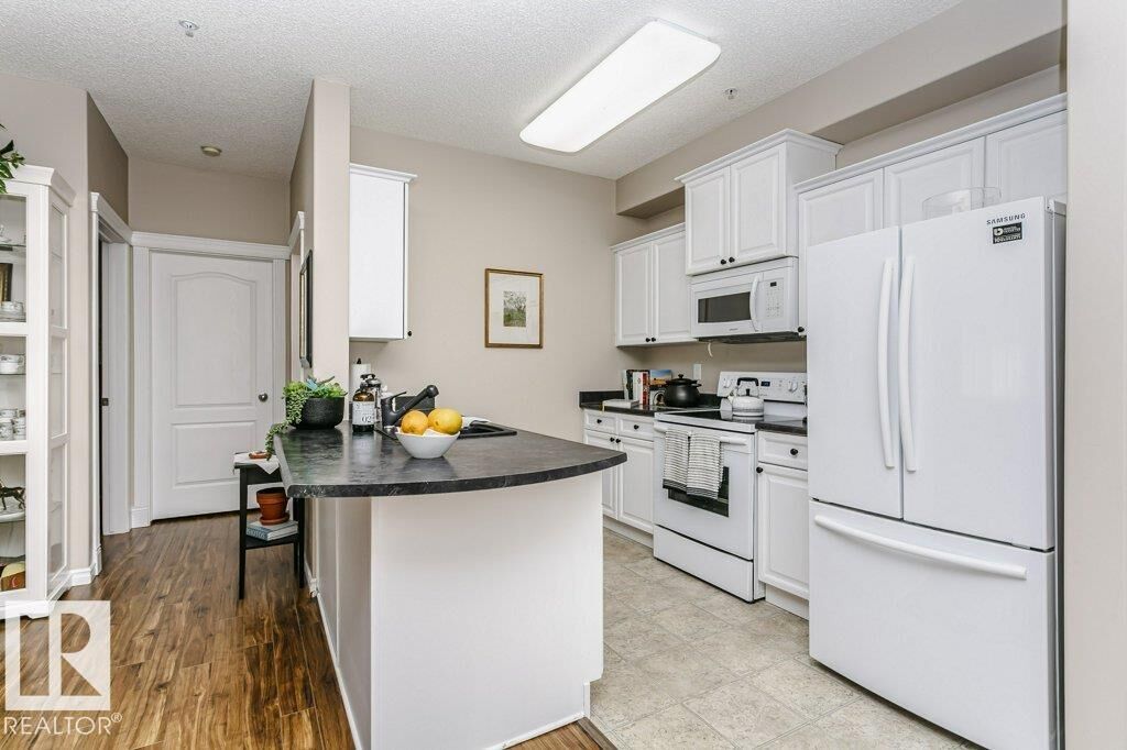 Property Photo: 16807 100 Avenue NW 323 AB T5P 4Z6