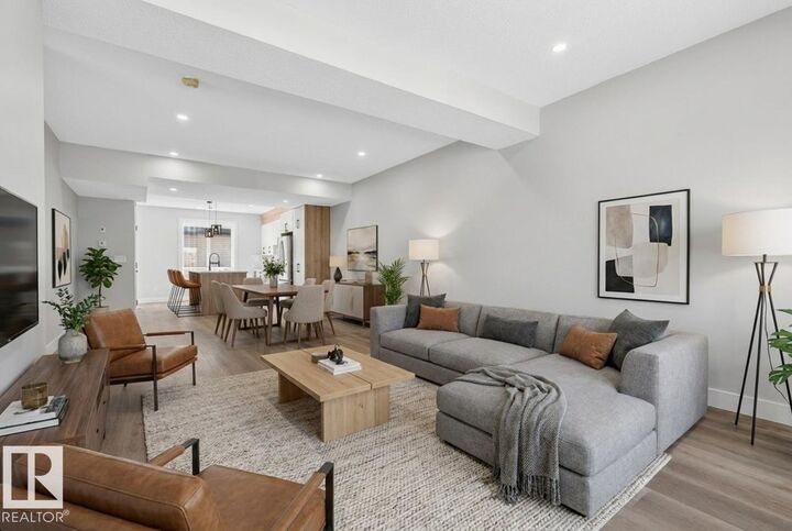 Property Photo:  10707-09 128 Avenue NW  AB T5E 0J4 