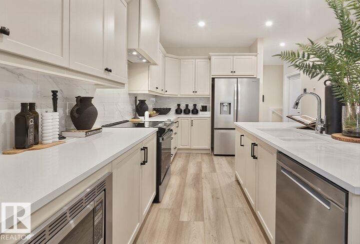 Property Photo:  12842 213A Street NW  AB T5S 0R5 