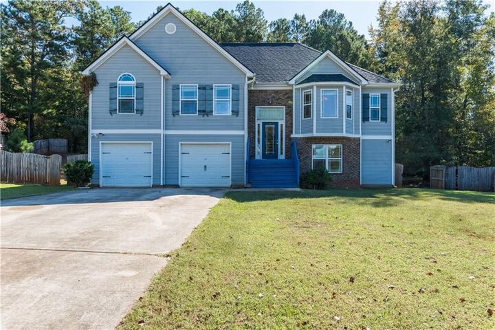 Property Photo:  404 Woodcreek  GA 30224 