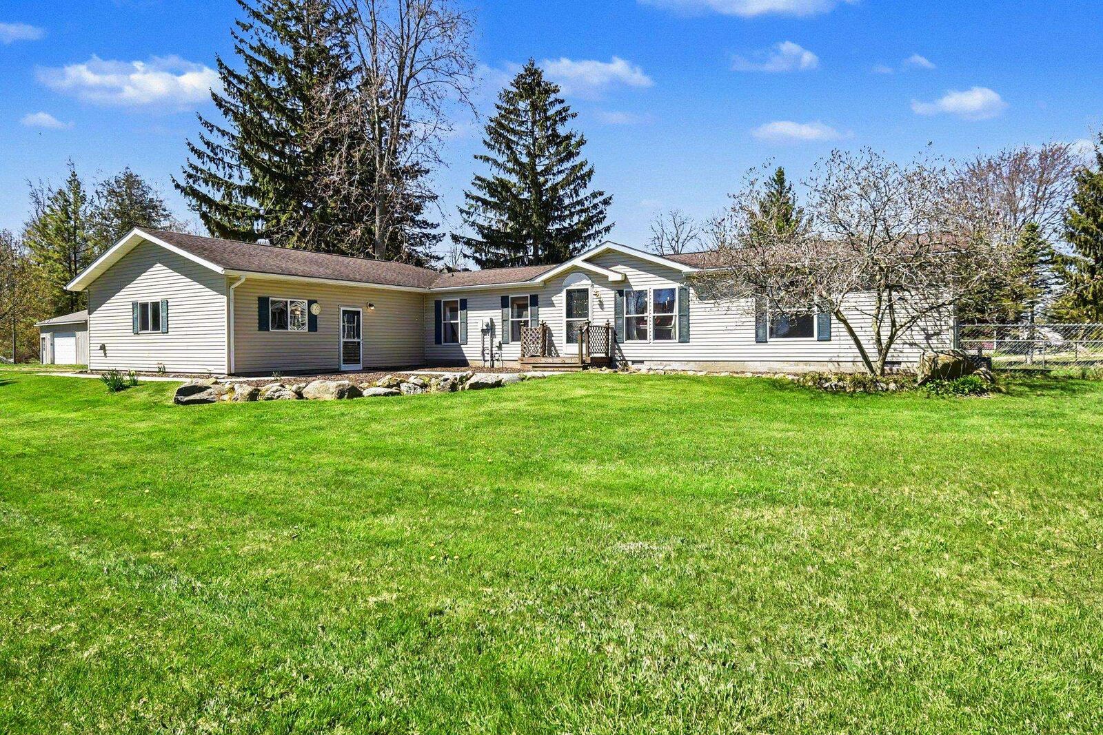 Property Photo:  9815 Forest Drive  MI 48441 