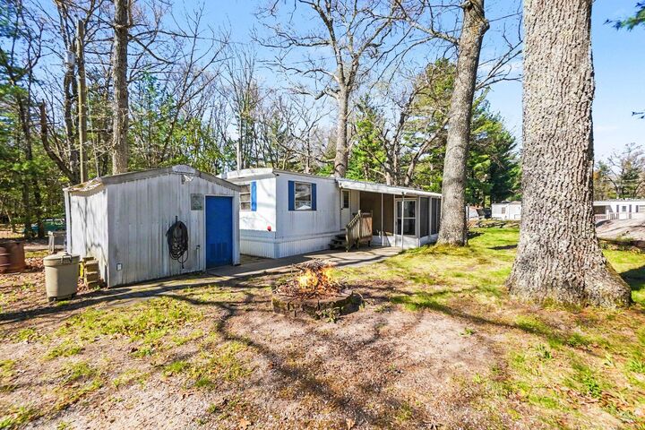 Property Photo:  8176 W Pine Grove Beach Drive  MI 49304 