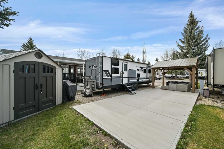 Property Photo:  370165 79 Street E 115  AB T0L 0A0 
