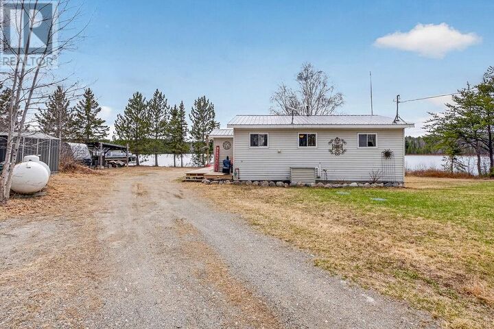 Property Photo:  4 Bugg Lake Road N  ON P0M 3C0 