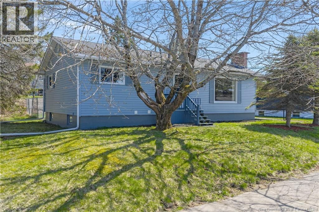 Property Photo:  892 Mollins Drive  NB E2M 4L8 