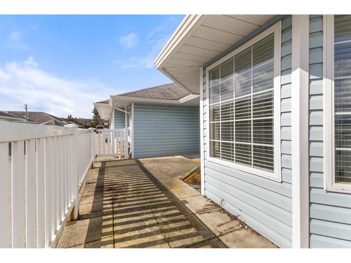 Property Photo:  1450 McCallum Road 8  BC V2S 8A5 