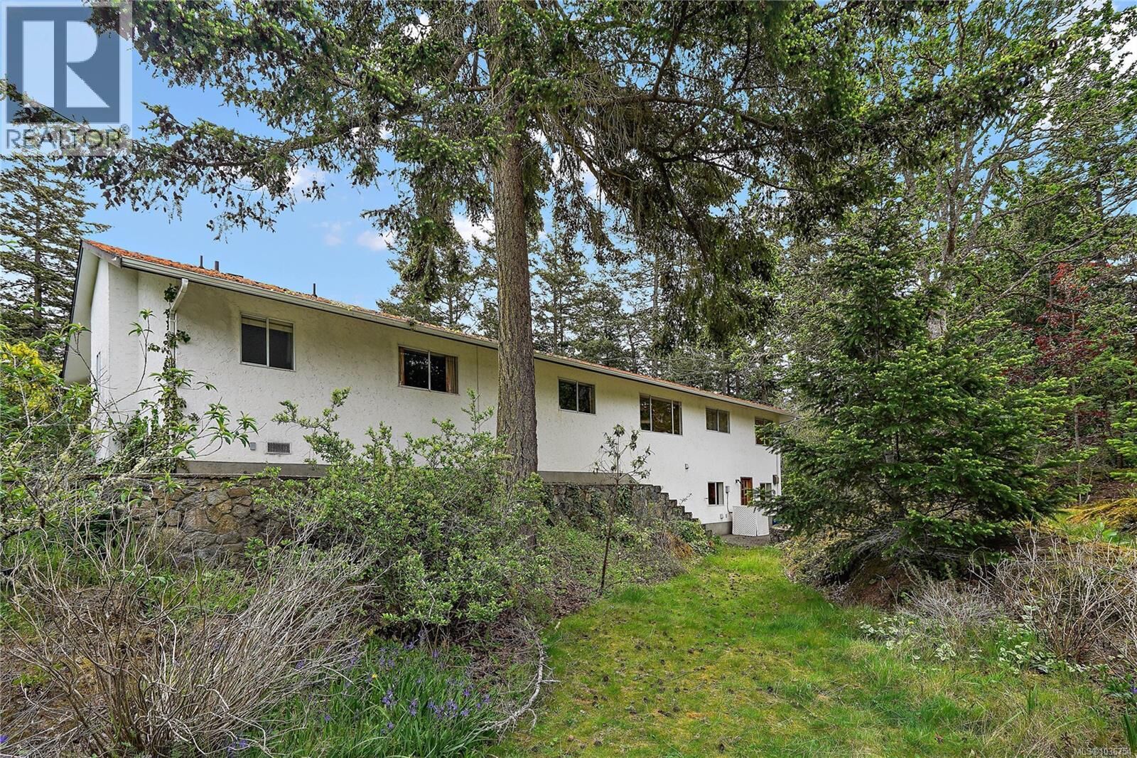 Property Photo:  3976 Tudor Avenue  BC V8N 4L6 