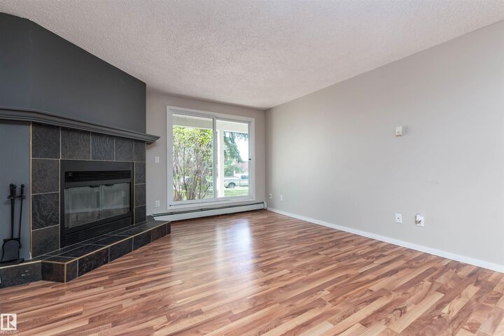 Property Photo:  328 Woodbridge Way 104  AB T8A 4G3 