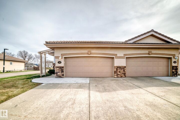 Property Photo:  13808 155 Avenue NW 40  AB T6V 1T8 