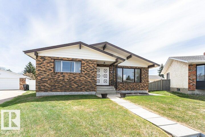 Property Photo:  6719 31A Avenue NW  AB T6K 1M4 