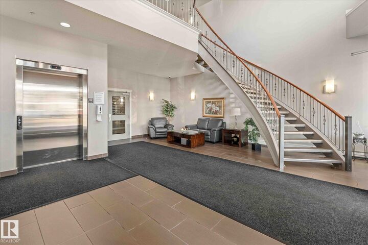 Property Photo:  5211 50 Street 110  AB T7Z 0C1 