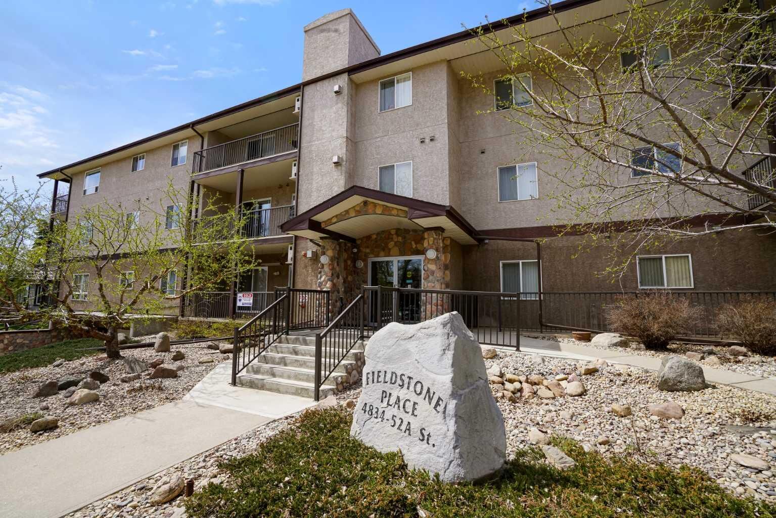 Property Photo: 4834 52A Street 101 AB T4V 1W4