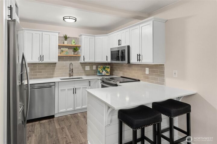 Property Photo:  1425 S Puget Drive I 2  WA 98055 
