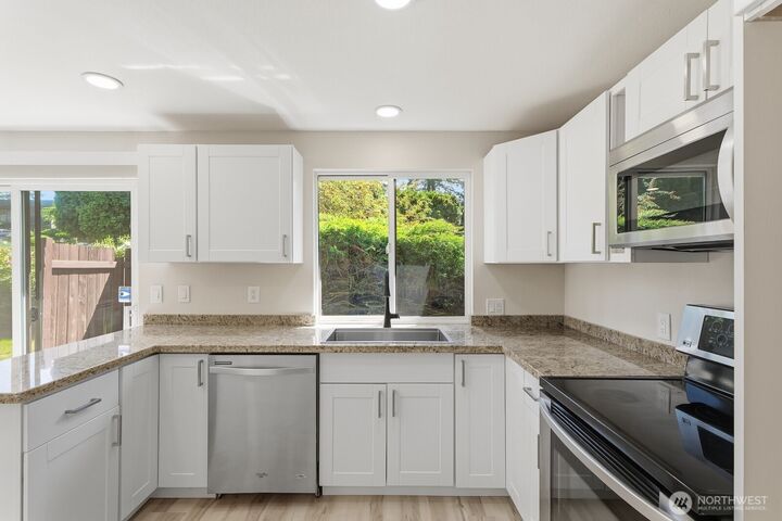 Property Photo:  5311  188th Street SW C-10  WA 98037 
