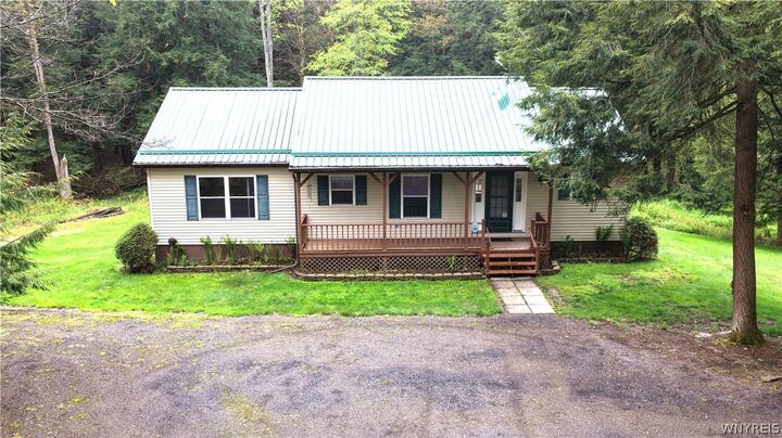 Property Photo:  5779 Windfall Road  NY 14748 