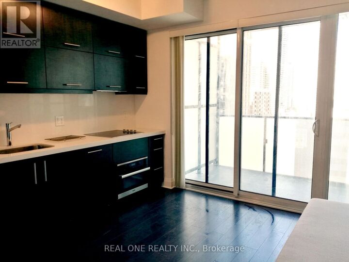 Property Photo:  65 St Mary Street 1810  ON M5S 0A6 