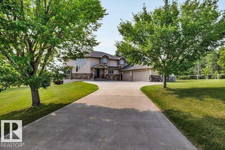 Property Photo: 19-51214 Rge Rd 260 AB T7Y 1B1