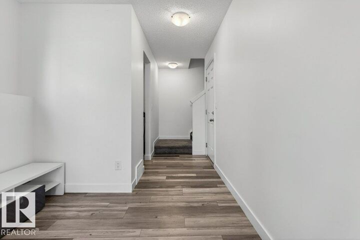 Property Photo:  20315 16 Avenue NW  AB T6M 1K8 