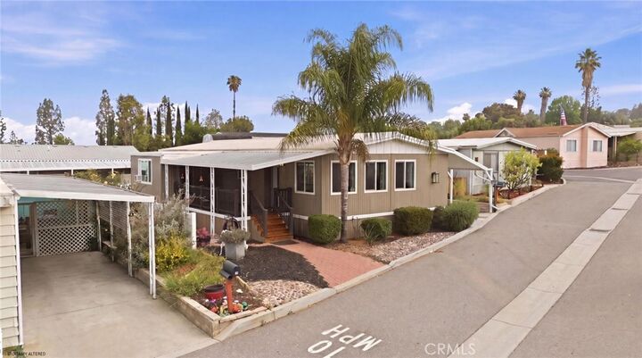 Property Photo: 15181 Van Buren Blvd 57 CA 92506