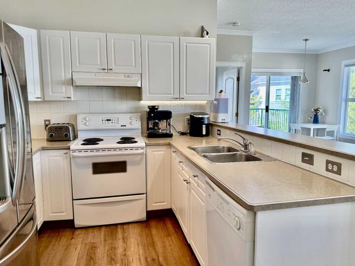 Property Photo:  102 Prestwick Gardens SE  AB T2Z 3V4 