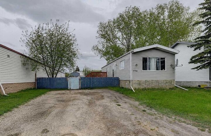 Property Photo:  9766 119A Avenue  AB T8V 5H7 