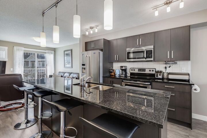 Property Photo:  1225 Kings Heights Way SE 402  AB T4A 0T7 