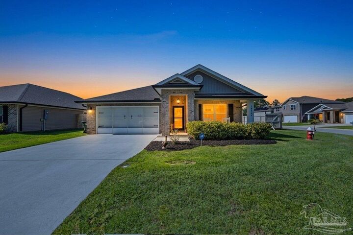 Property Photo:  10560 Queens Gate Cir  FL 32506 