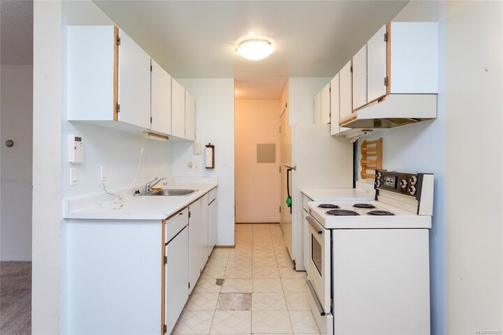Property Photo:  3255 Glasgow Ave #409  BC V8X 4S4 