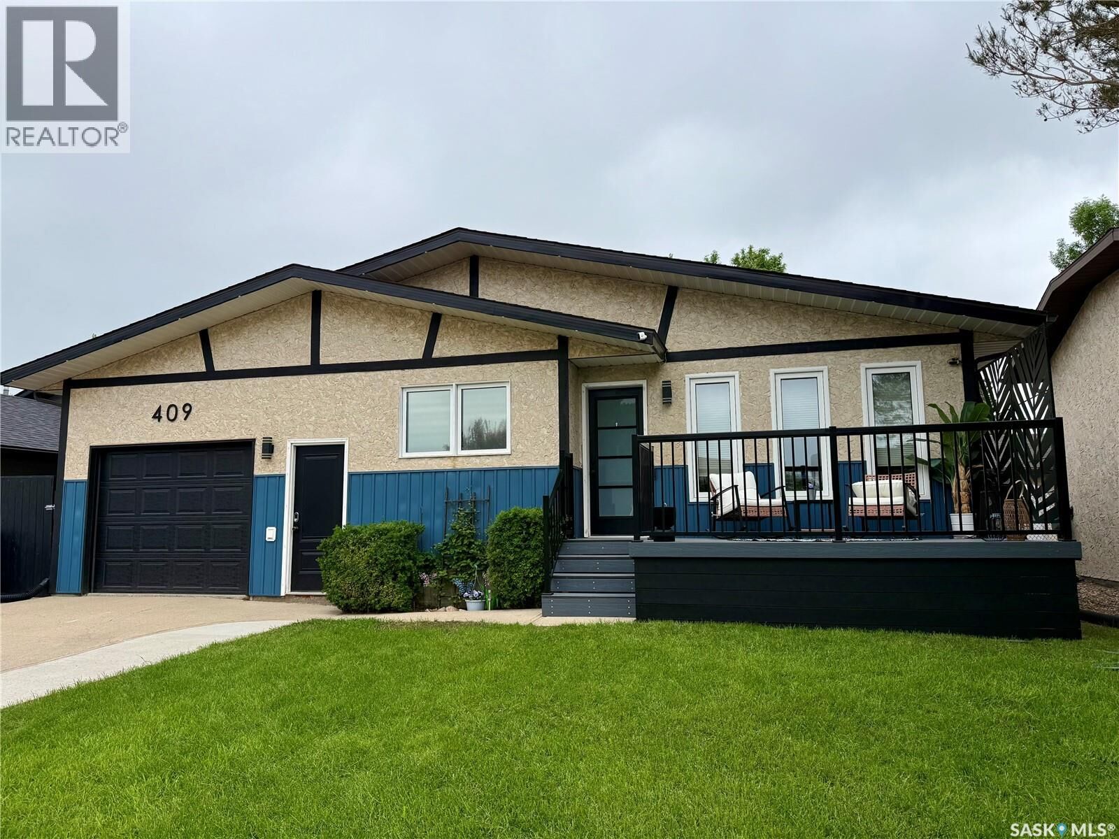 Property Photo: 409 Brooks Road SK S4A 2P2